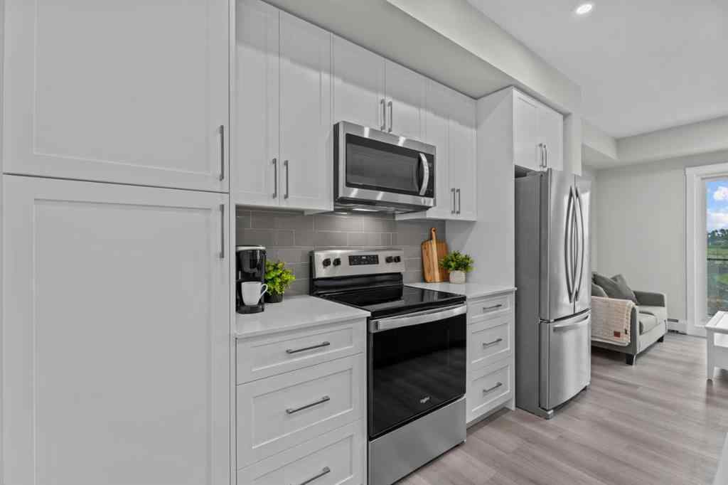 MLS® A2266695 - Unit #2406 100 Banister Drive  in Wedderburn Okotoks, Residential