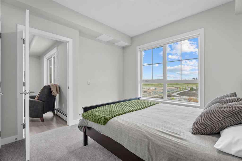 MLS® A2266695 - Unit #2406 100 Banister Drive  in Wedderburn Okotoks, Residential