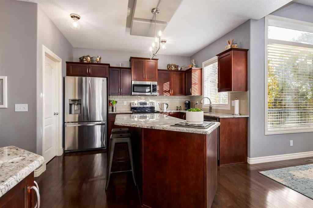 MLS® A2266700 - 27 Tuscany Estates Drive NW in Tuscany Calgary, Residential