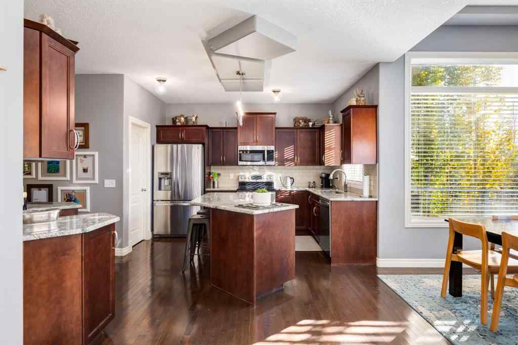 MLS® A2266700 - 27 Tuscany Estates Drive NW in Tuscany Calgary, Residential