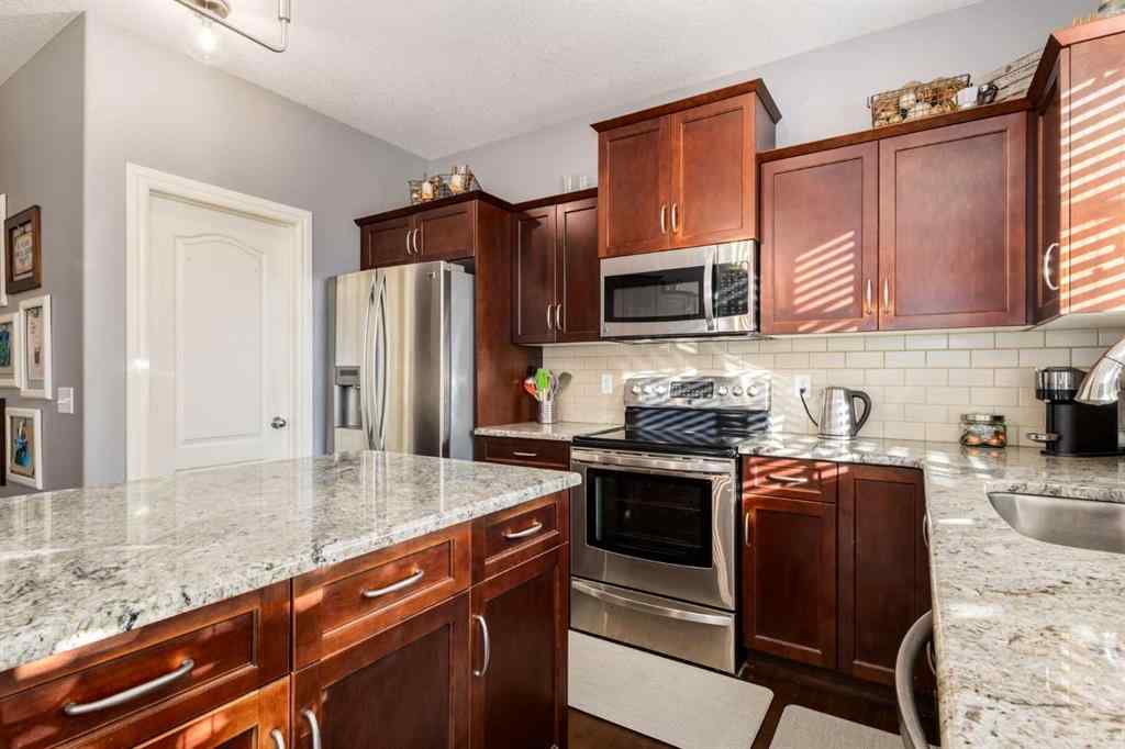 MLS® A2266700 - 27 Tuscany Estates Drive NW in Tuscany Calgary, Residential