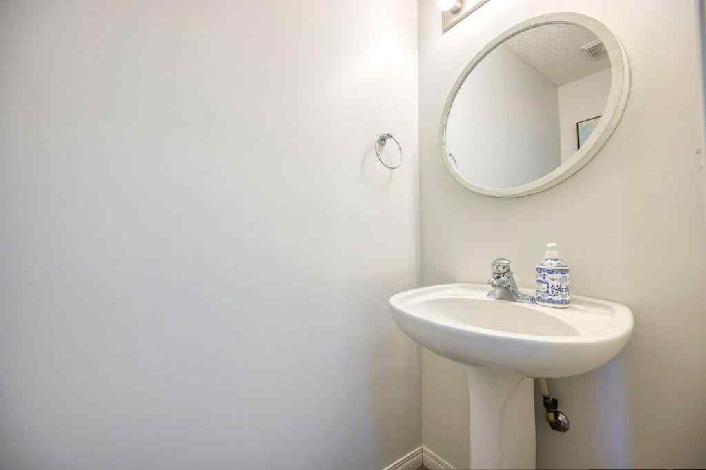 MLS® A2266703 - 165 Bayside Point SW in Bayside Airdrie, Residential