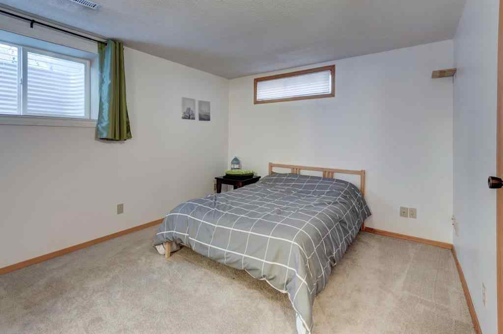 MLS® A2266711 - 19 Woodglen Grove SW in Woodbine Calgary, Residential