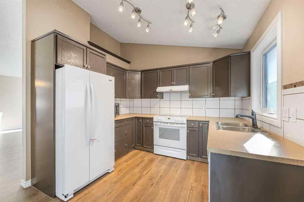 MLS® A2266718 - 215 Hidden Vale Place NW in Hidden Valley Calgary, Residential