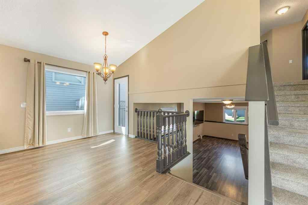 MLS® A2266718 - 215 Hidden Vale Place NW in Hidden Valley Calgary, Residential