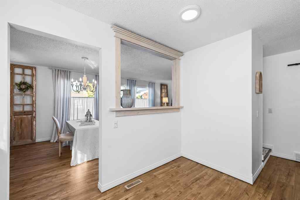 MLS® A2266747 - 217 Acacia Crescent SE in Airdrie Meadows Airdrie, Residential