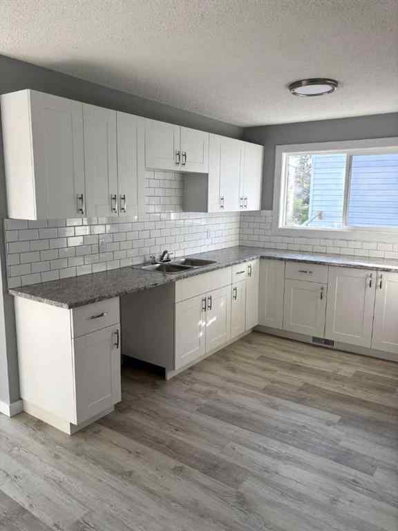 MLS® A2266751 - 8117 94 Street  in Patterson Place Grande Prairie, Residential