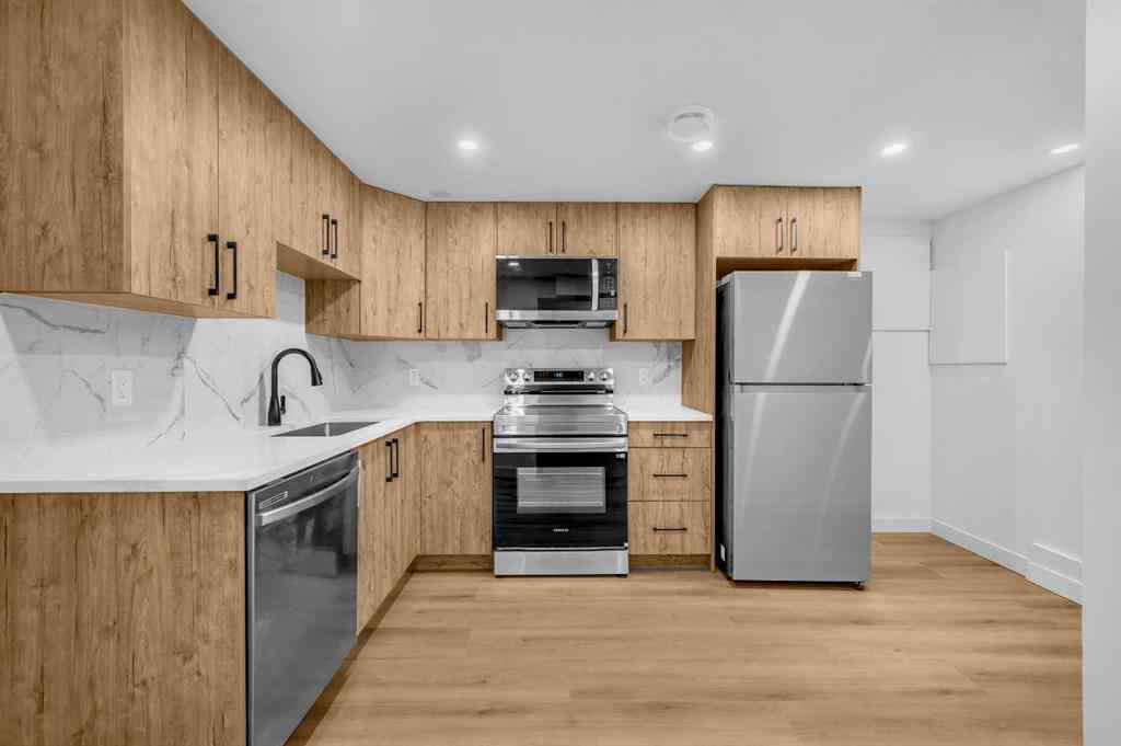 MLS® A2266772 - 116 Queen Anne Road SE in Queensland Calgary, Residential