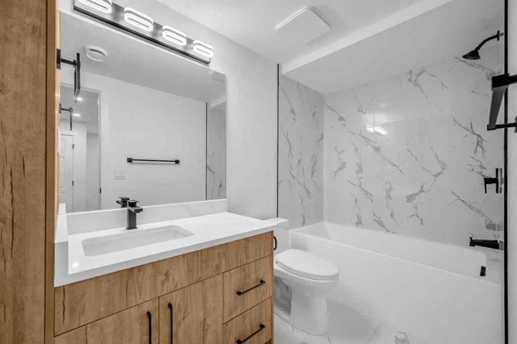 MLS® A2266772 - 116 Queen Anne Road SE in Queensland Calgary, Residential