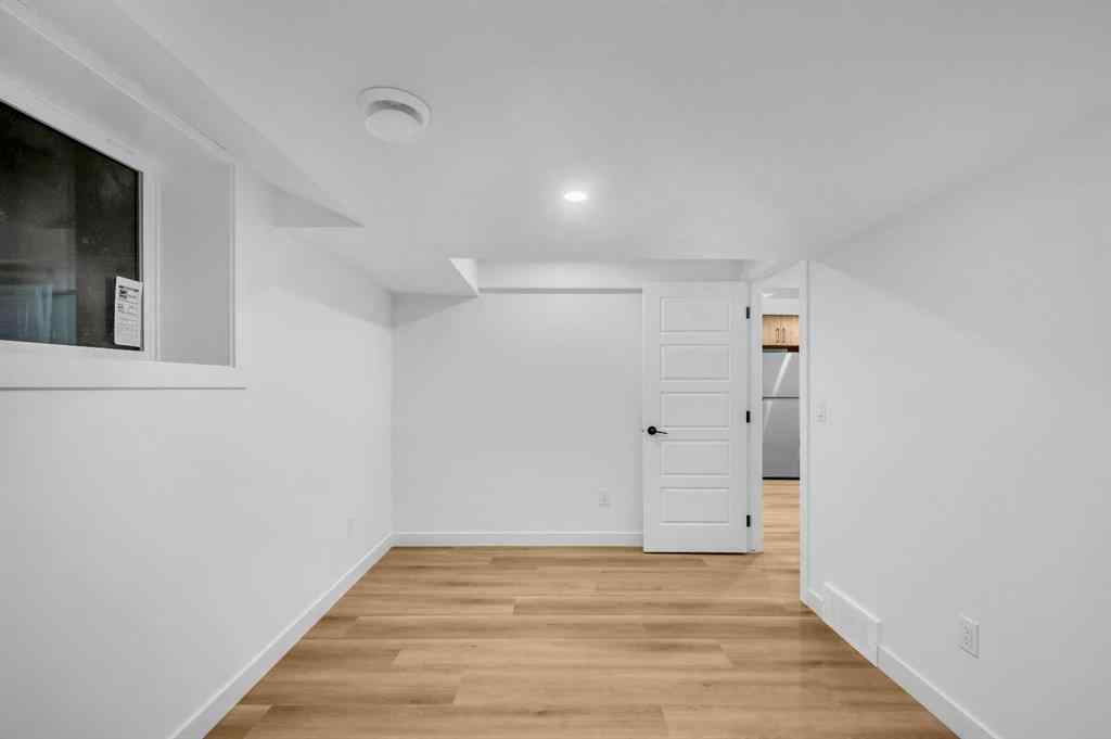 MLS® A2266772 - 116 Queen Anne Road SE in Queensland Calgary, Residential