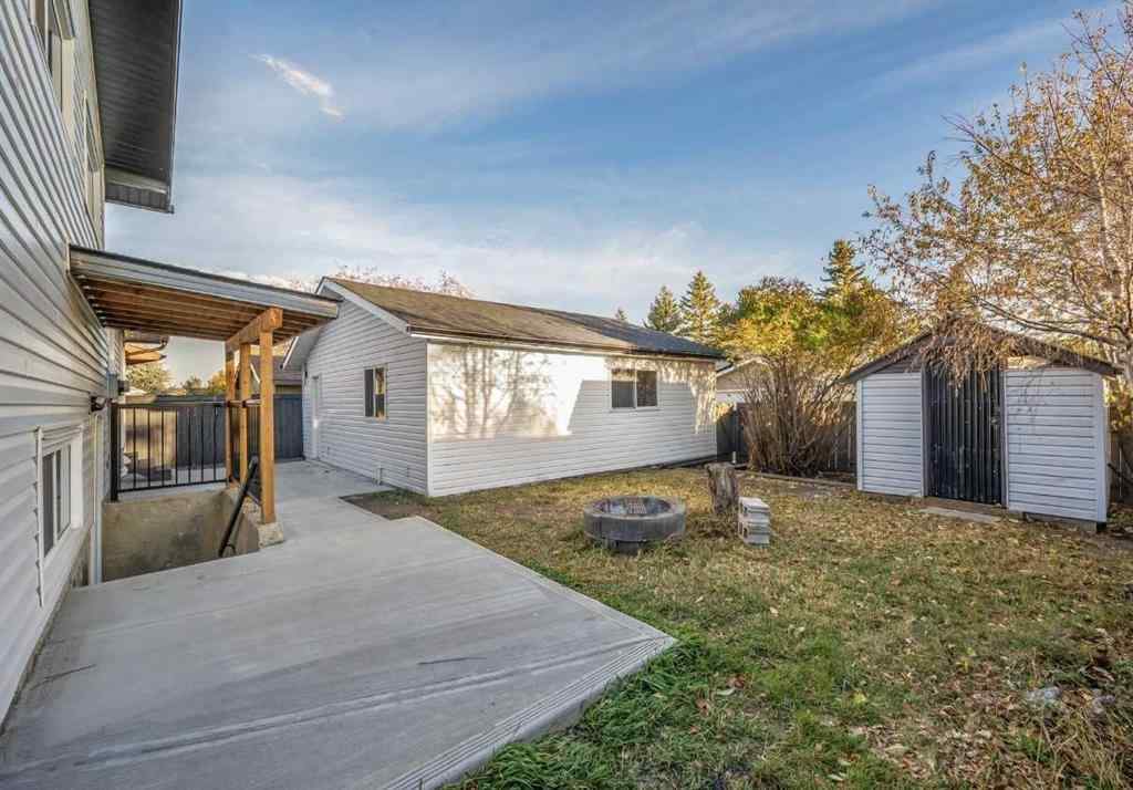 MLS® A2266772 - 116 Queen Anne Road SE in Queensland Calgary, Residential