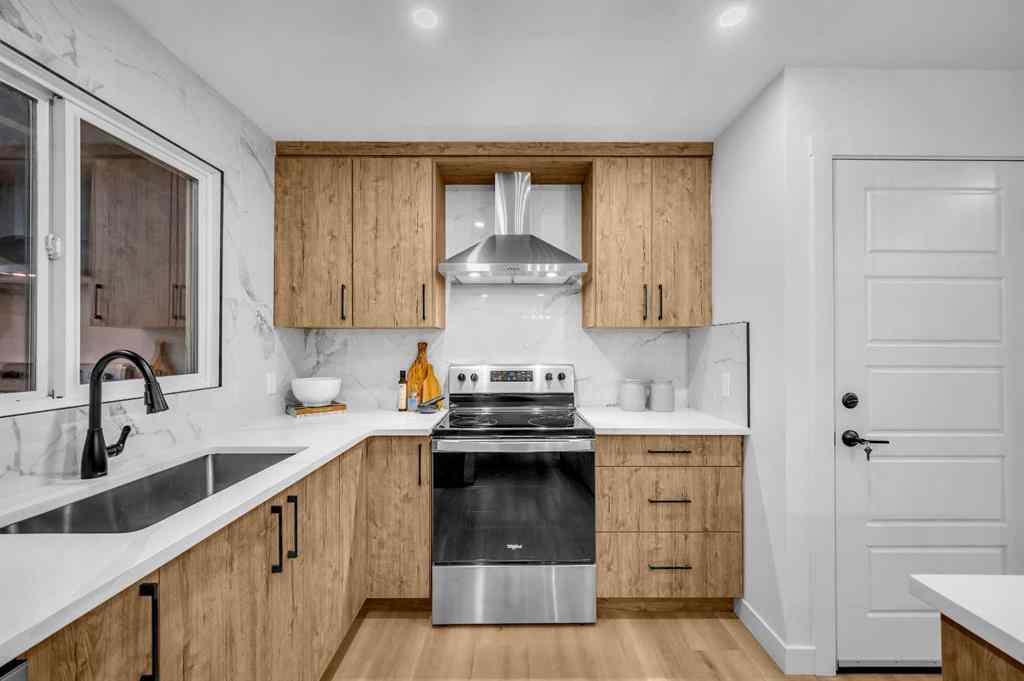 MLS® A2266772 - 116 Queen Anne Road SE in Queensland Calgary, Residential