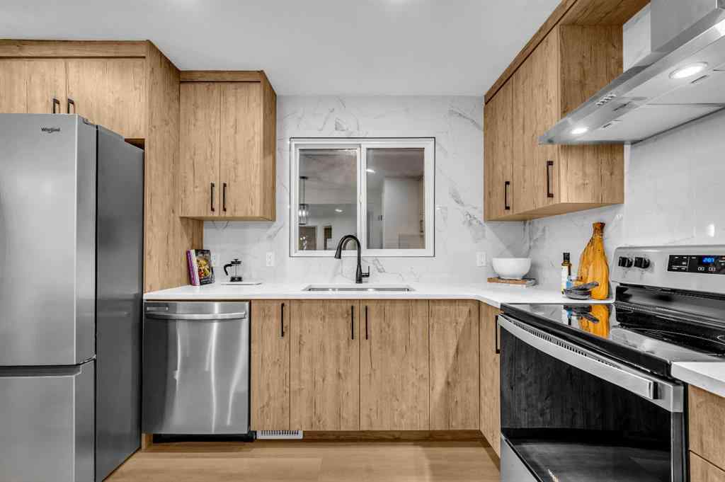 MLS® A2266772 - 116 Queen Anne Road SE in Queensland Calgary, Residential