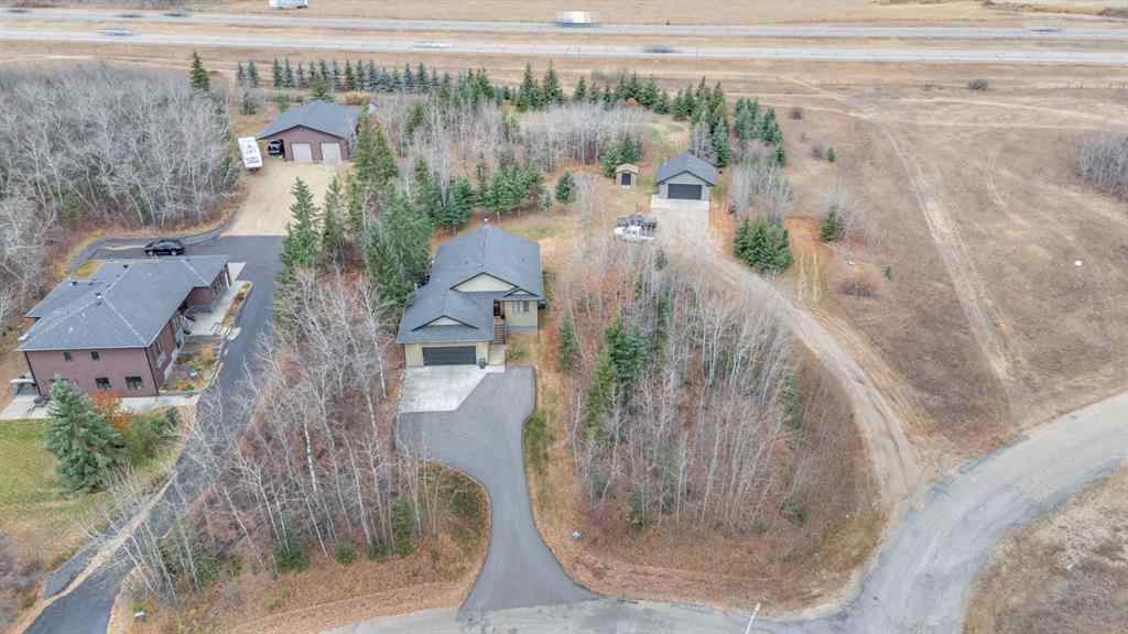 MLS® A2266778 - 15 Creek Road  in Wolf Creek Estates Rural Ponoka County, Residential