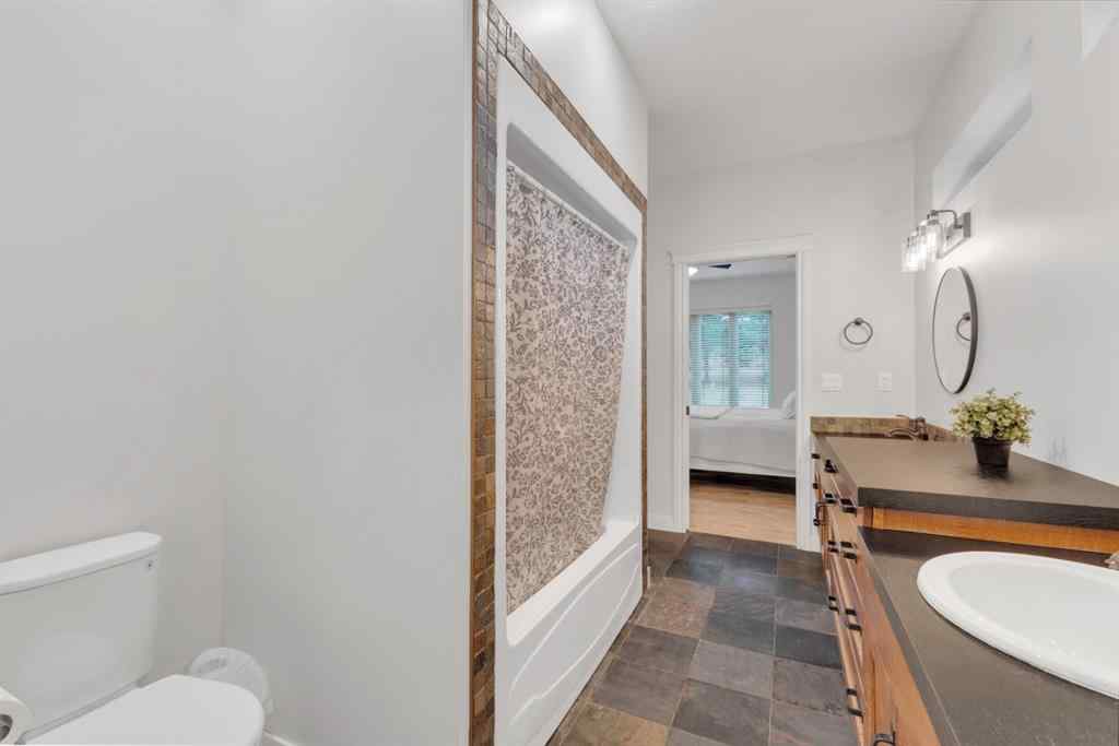 MLS® A2266778 - 15 Creek Road  in Wolf Creek Estates Rural Ponoka County, Residential