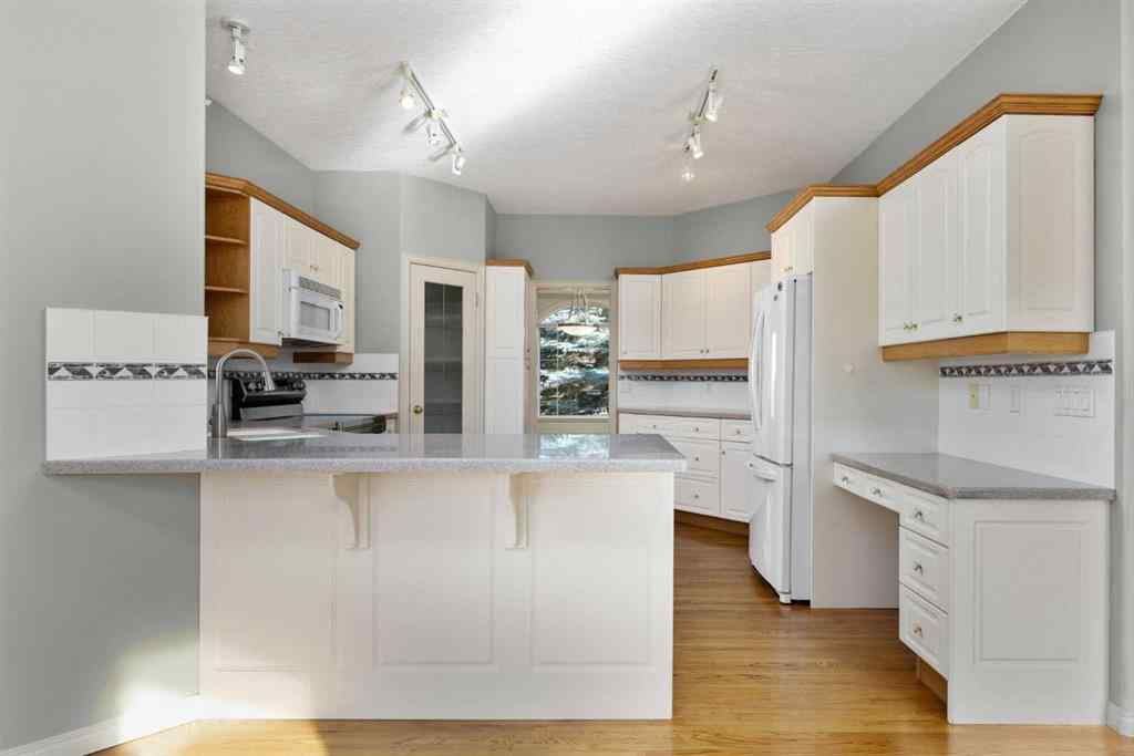 MLS® A2266783 - 103 West Terrace Point  in West Terrace Cochrane, Residential