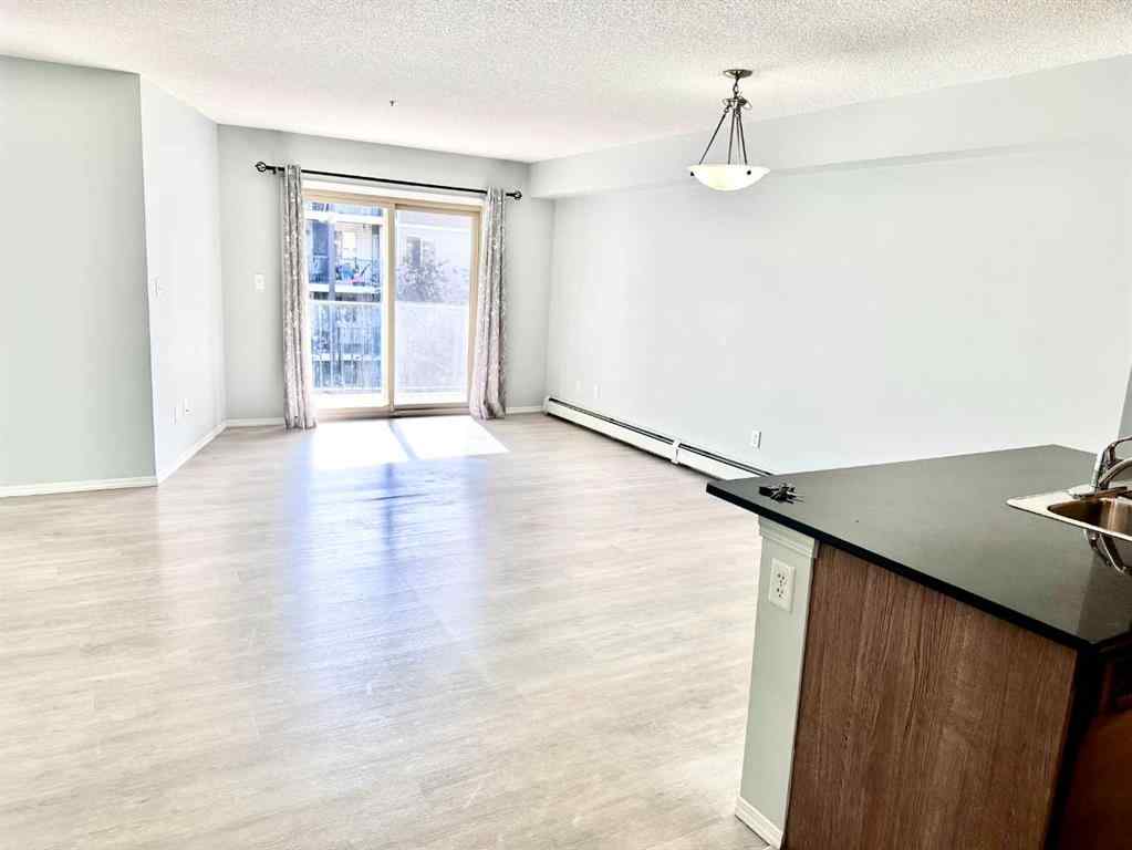 MLS® A2266787 - Unit #321 7110 80 Avenue NE in Saddle Ridge Calgary, Residential