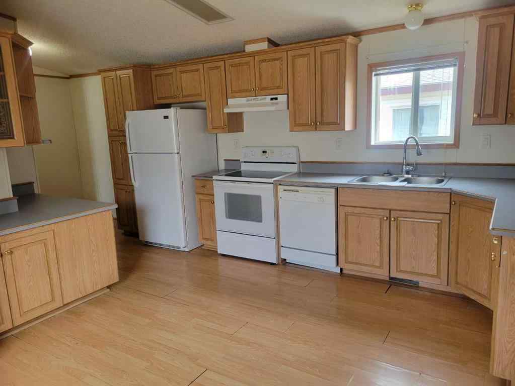 MLS® A2266807 - 9006 87 Avenue  in MH - Creekside Grande Prairie, Residential