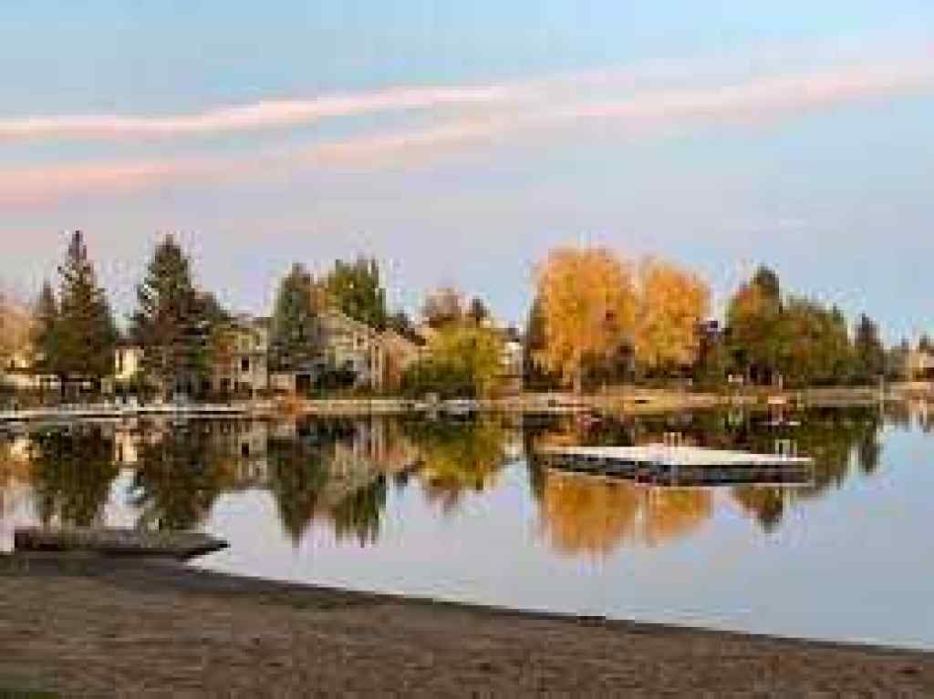 MLS® A2266811 - 52 Sunhurst Road SE in Sundance Calgary, Residential