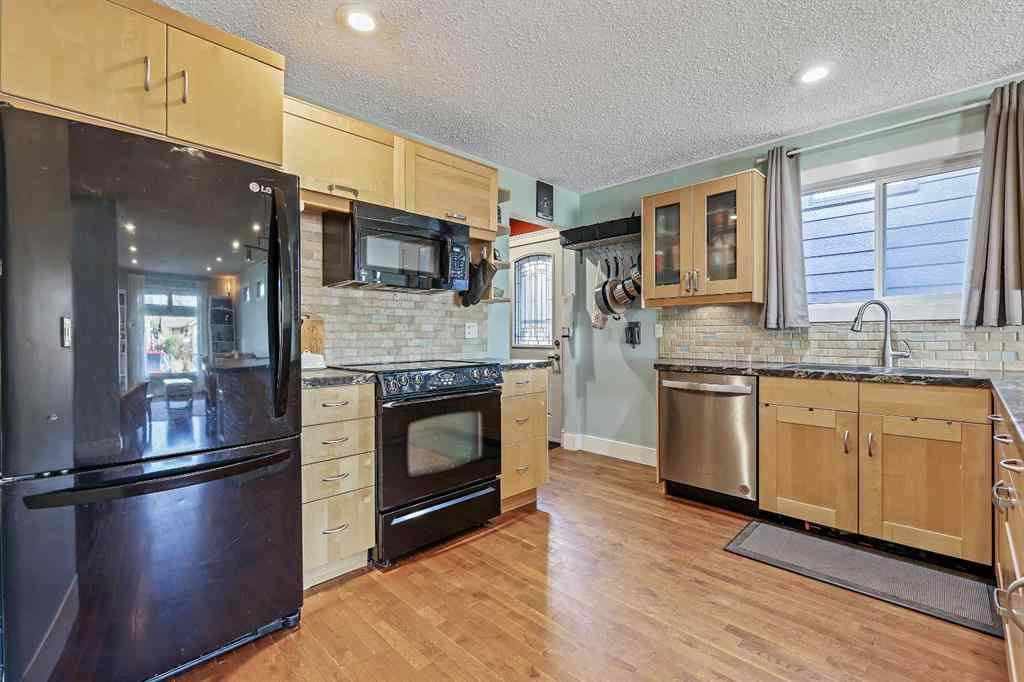 MLS® A2266811 - 52 Sunhurst Road SE in Sundance Calgary, Residential
