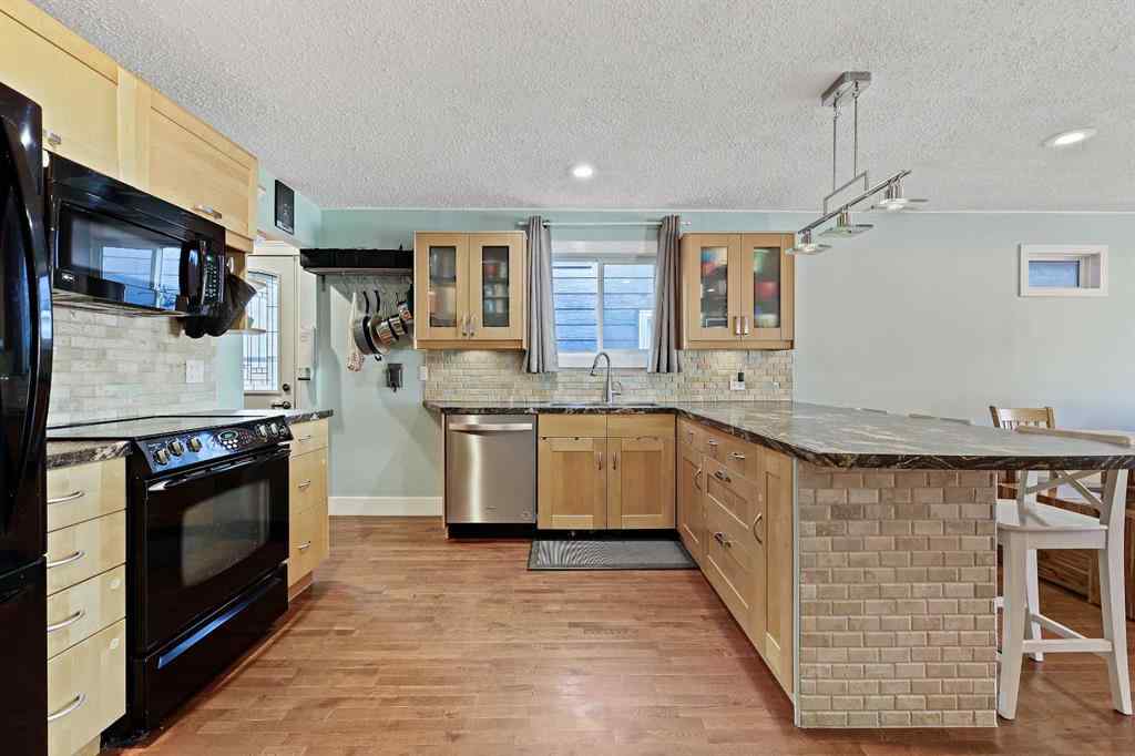 MLS® A2266811 - 52 Sunhurst Road SE in Sundance Calgary, Residential