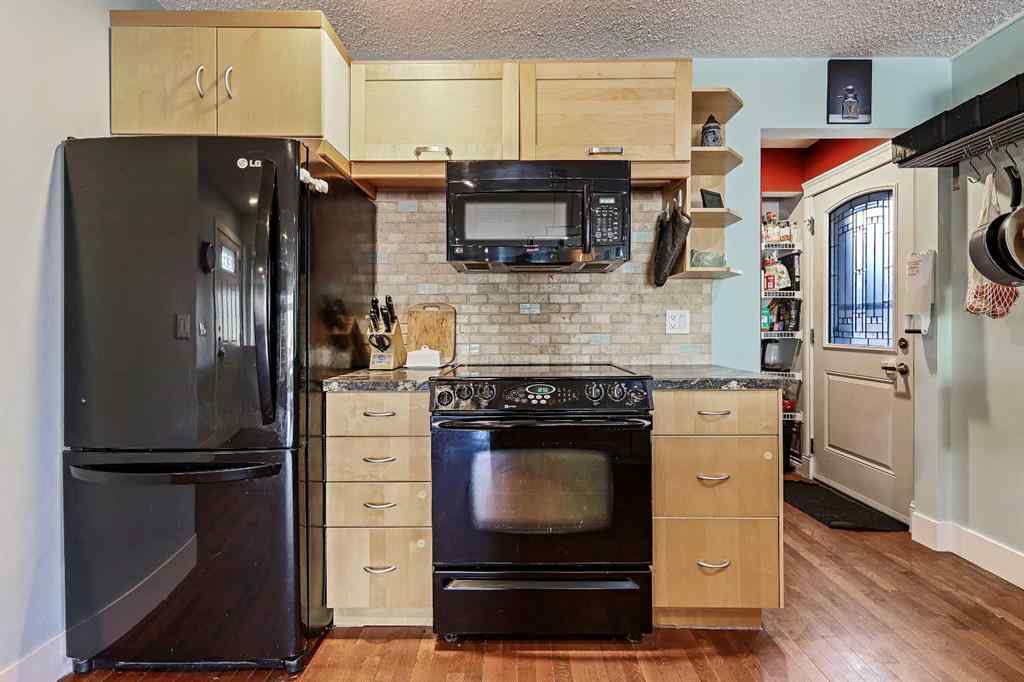 MLS® A2266811 - 52 Sunhurst Road SE in Sundance Calgary, Residential