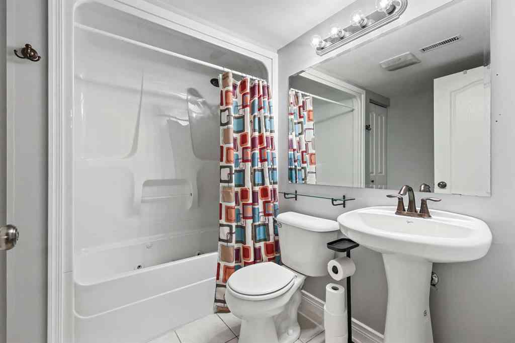 MLS® A2266811 - 52 Sunhurst Road SE in Sundance Calgary, Residential