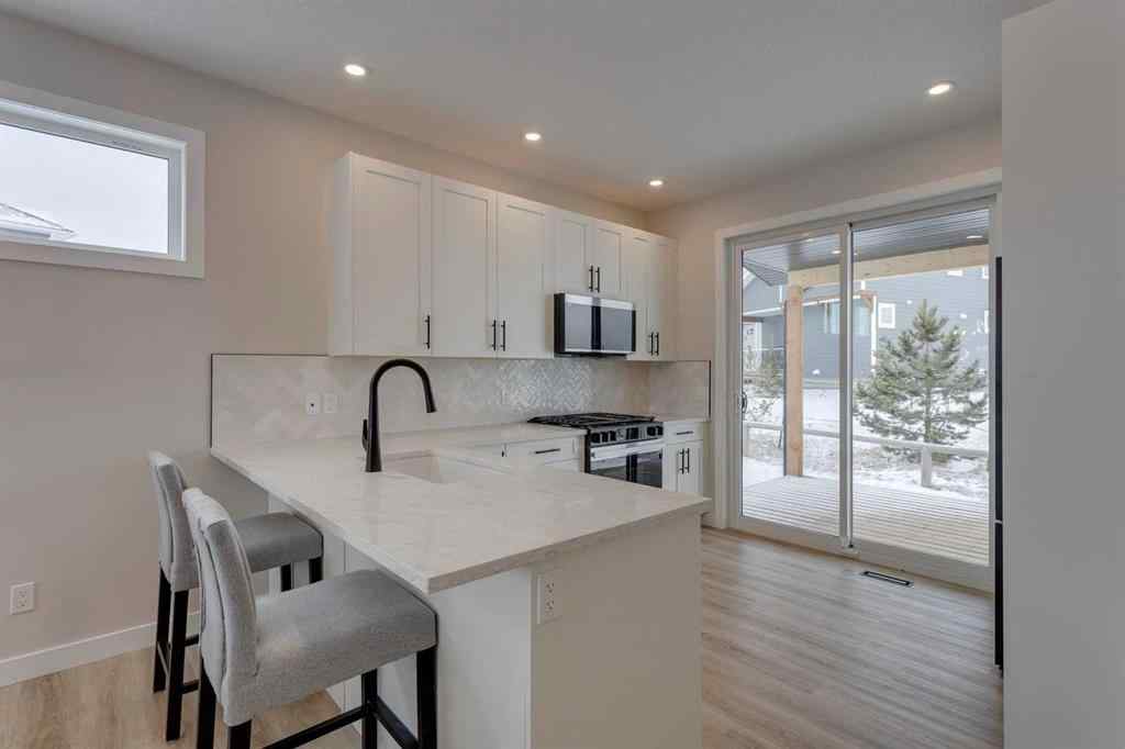 MLS® A2266824 - 105 Cottageclub Drive  in Cottage Club at Ghost Lake Rural Rocky View County, Residential