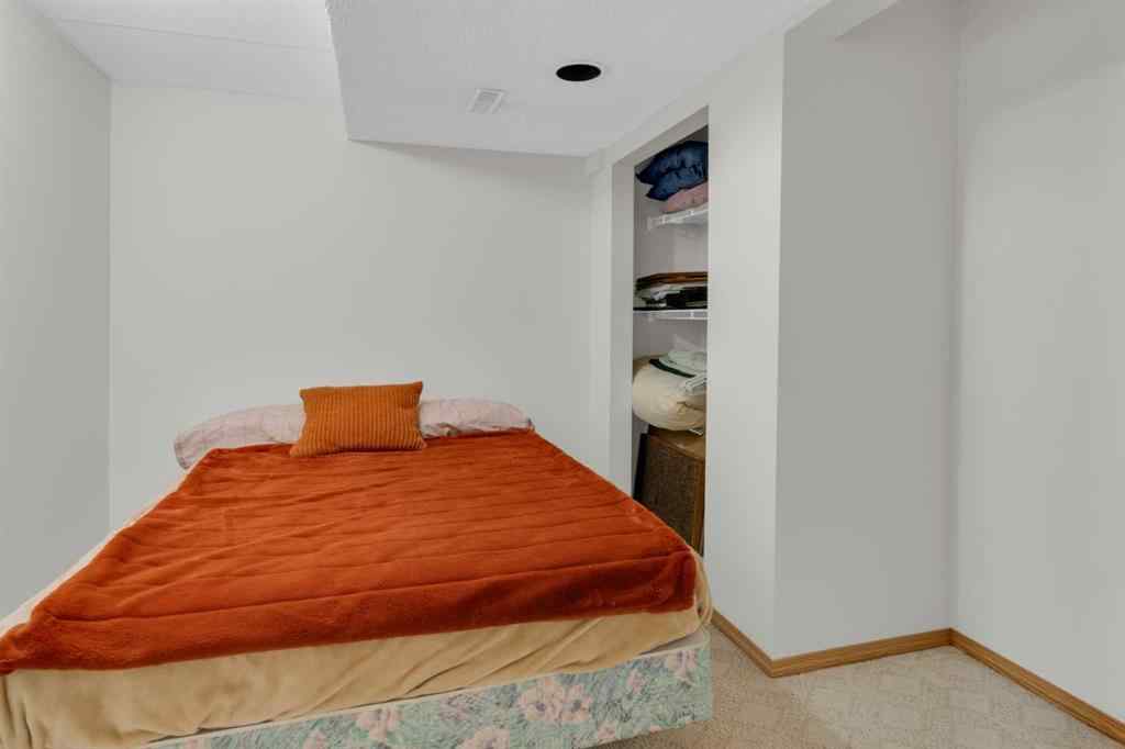 MLS® A2266859 - 50 Christie Gardens SW in Christie Park Calgary, Residential