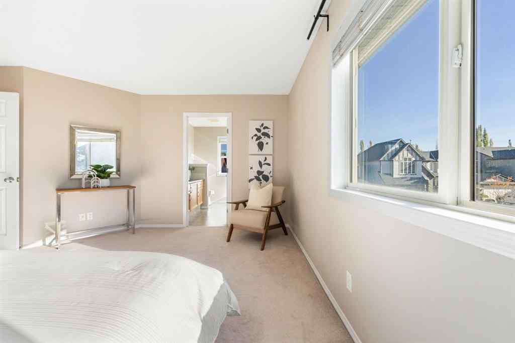 MLS® A2266860 - 91 Cougartown Close SW in Cougar Ridge Calgary, Residential