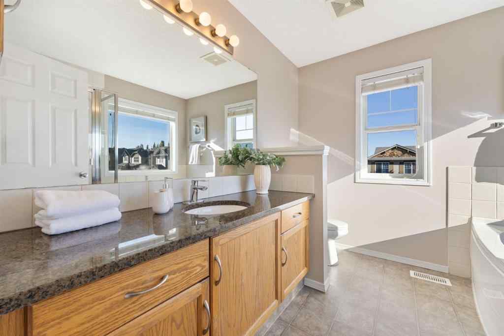 MLS® A2266860 - 91 Cougartown Close SW in Cougar Ridge Calgary, Residential