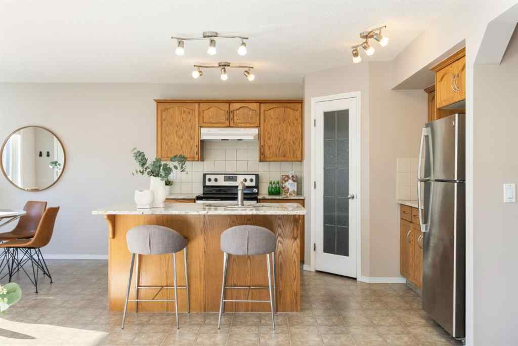 MLS® A2266860 - 91 Cougartown Close SW in Cougar Ridge Calgary, Residential