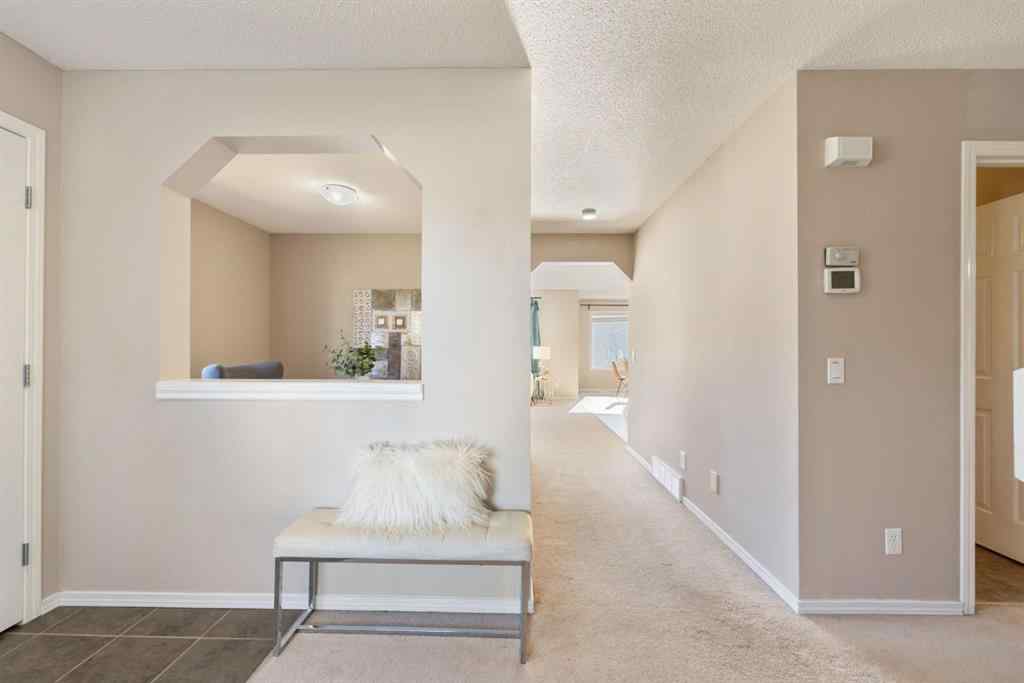 MLS® A2266860 - 91 Cougartown Close SW in Cougar Ridge Calgary, Residential