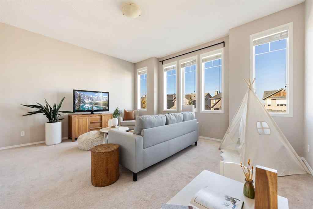 MLS® A2266860 - 91 Cougartown Close SW in Cougar Ridge Calgary, Residential