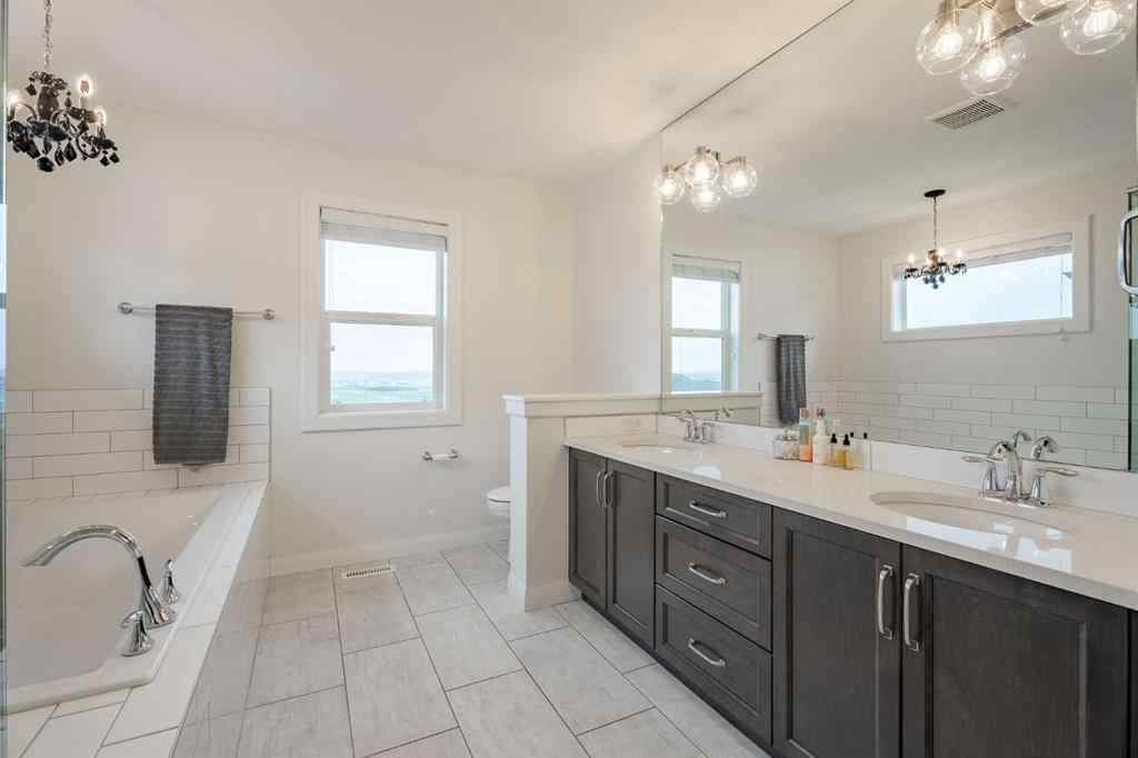 MLS® A2266873 - 2148 Ravensdun Crescent SE in Ravenswood Airdrie, Residential