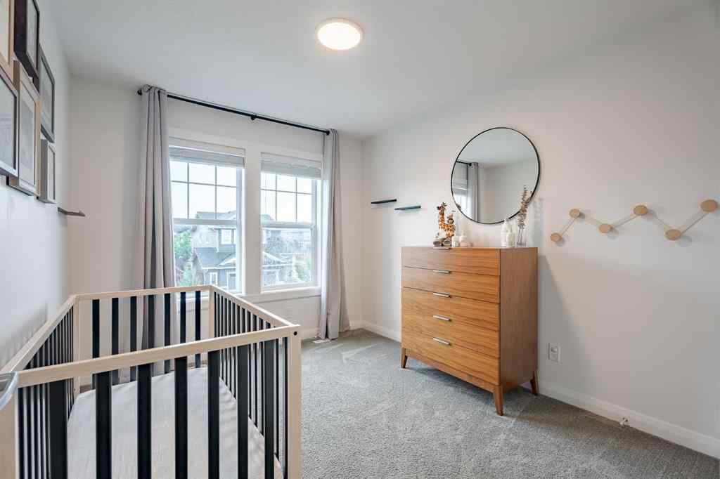 MLS® A2266873 - 2148 Ravensdun Crescent SE in Ravenswood Airdrie, Residential