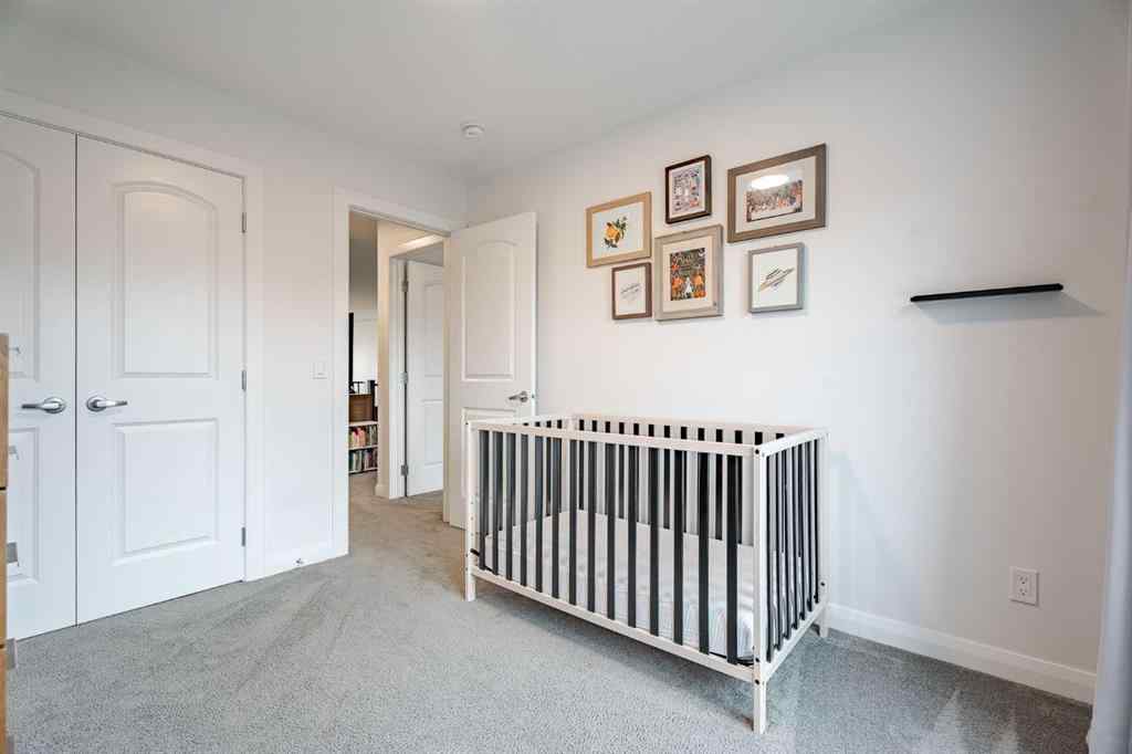 MLS® A2266873 - 2148 Ravensdun Crescent SE in Ravenswood Airdrie, Residential