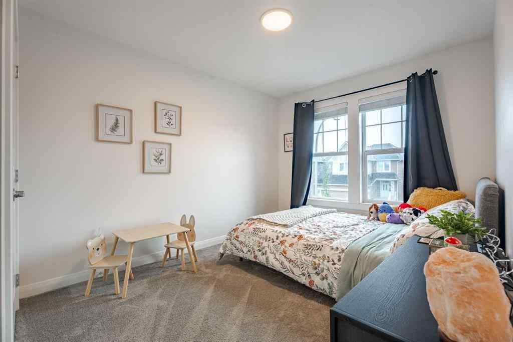 MLS® A2266873 - 2148 Ravensdun Crescent SE in Ravenswood Airdrie, Residential