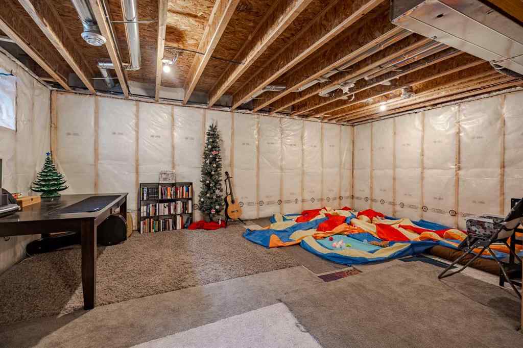 MLS® A2266873 - 2148 Ravensdun Crescent SE in Ravenswood Airdrie, Residential