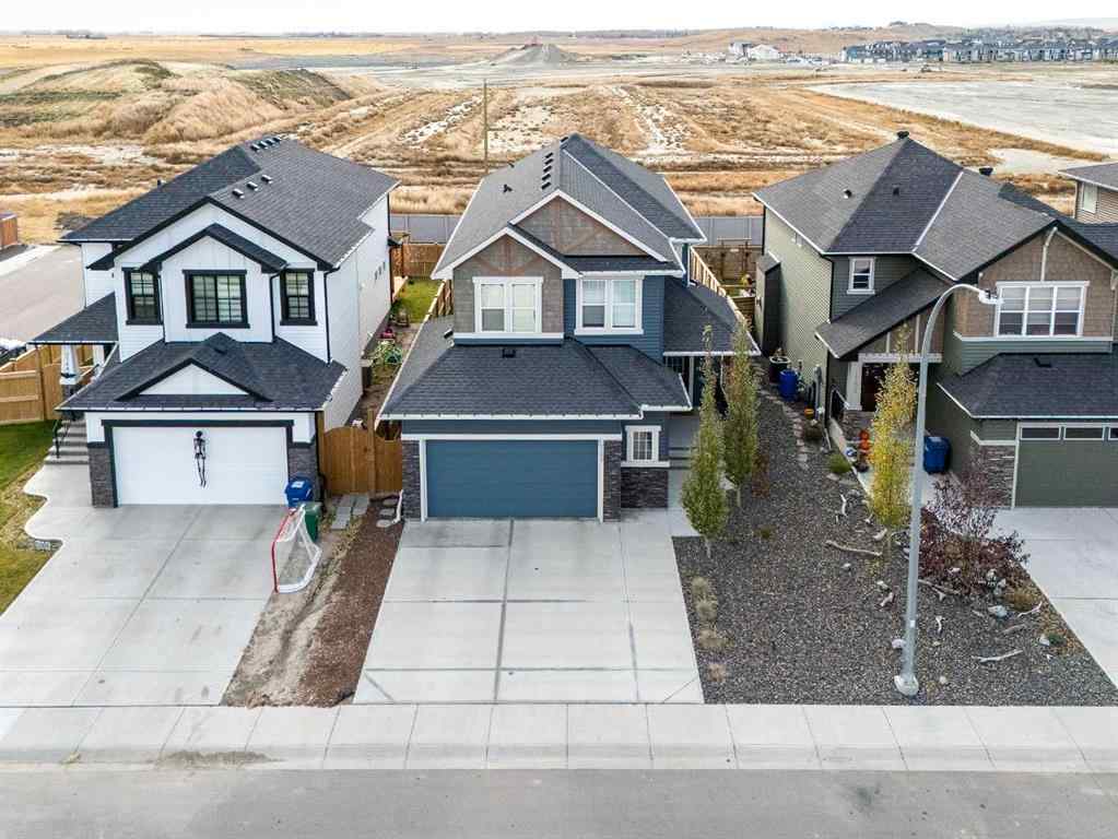 MLS® A2266873 - 2148 Ravensdun Crescent SE in Ravenswood Airdrie, Residential