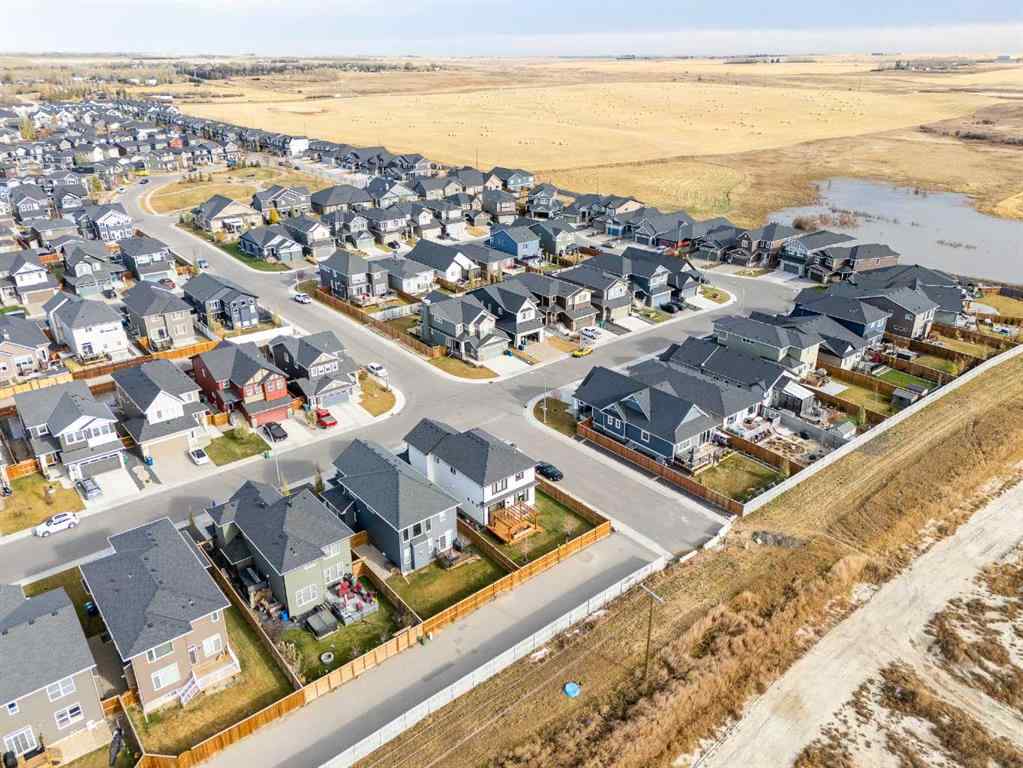 MLS® A2266873 - 2148 Ravensdun Crescent SE in Ravenswood Airdrie, Residential