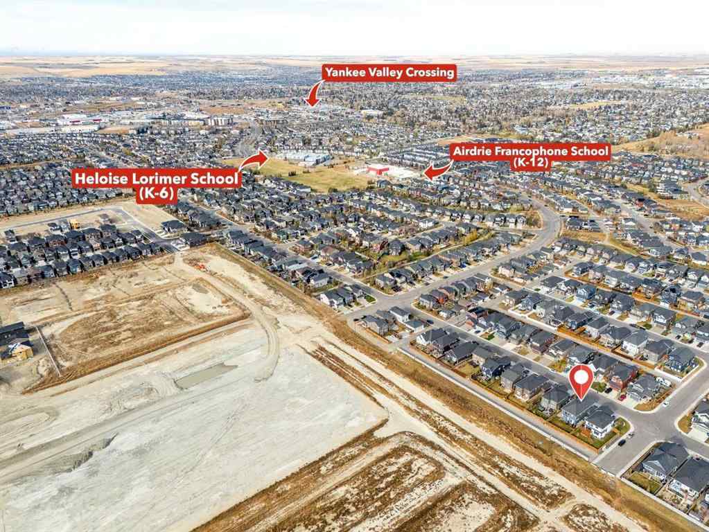 MLS® A2266873 - 2148 Ravensdun Crescent SE in Ravenswood Airdrie, Residential