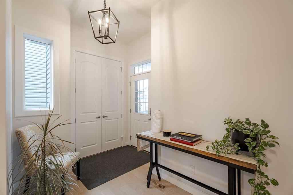 MLS® A2266873 - 2148 Ravensdun Crescent SE in Ravenswood Airdrie, Residential