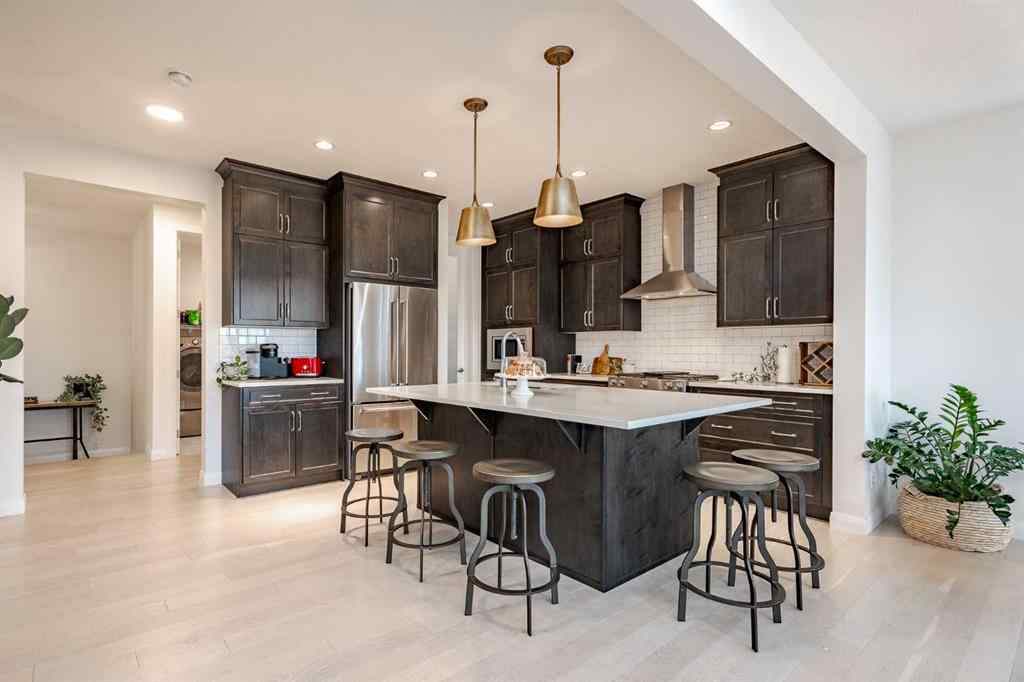 MLS® A2266873 - 2148 Ravensdun Crescent SE in Ravenswood Airdrie, Residential