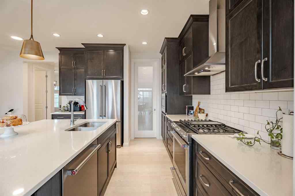 MLS® A2266873 - 2148 Ravensdun Crescent SE in Ravenswood Airdrie, Residential