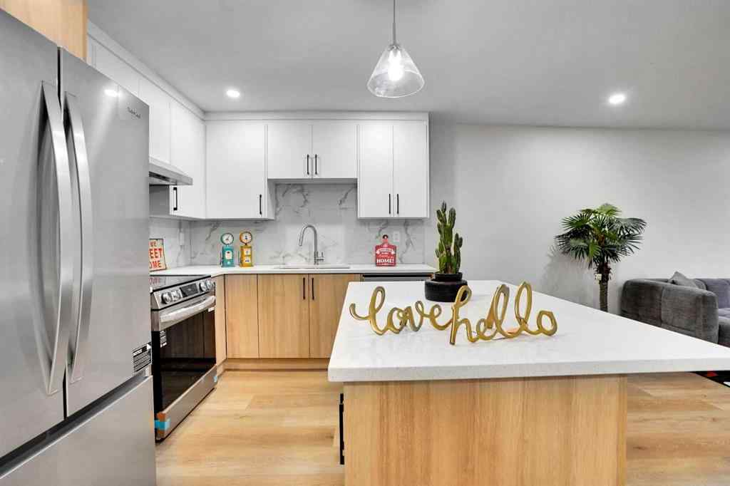 MLS® A2266880 - 903B Queensland Drive SE in Queensland Calgary, Residential