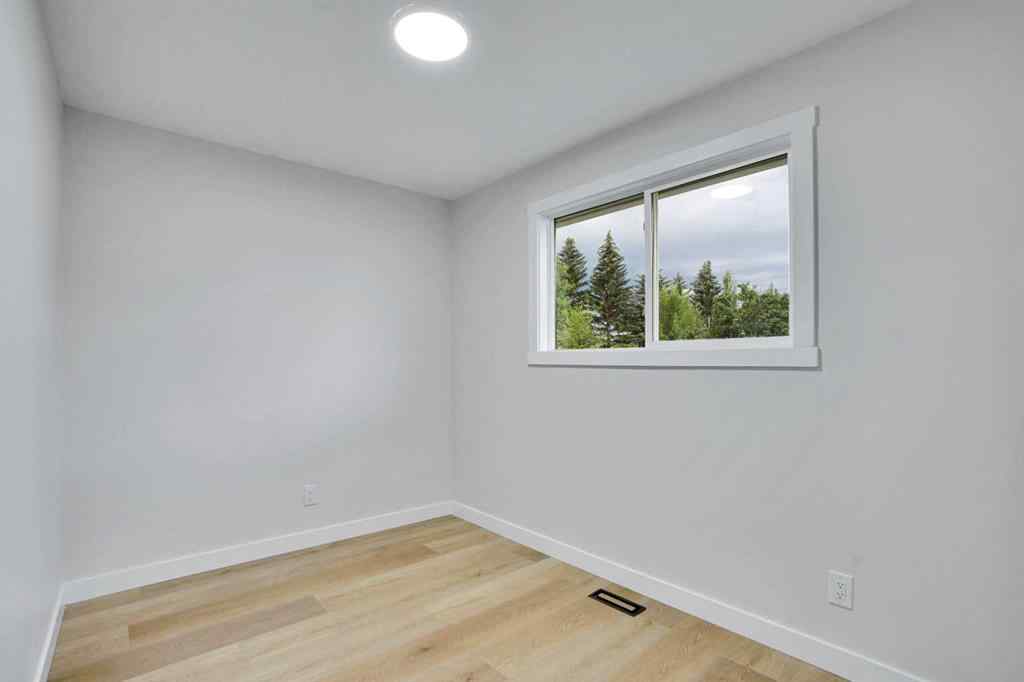 MLS® A2266880 - 903B Queensland Drive SE in Queensland Calgary, Residential