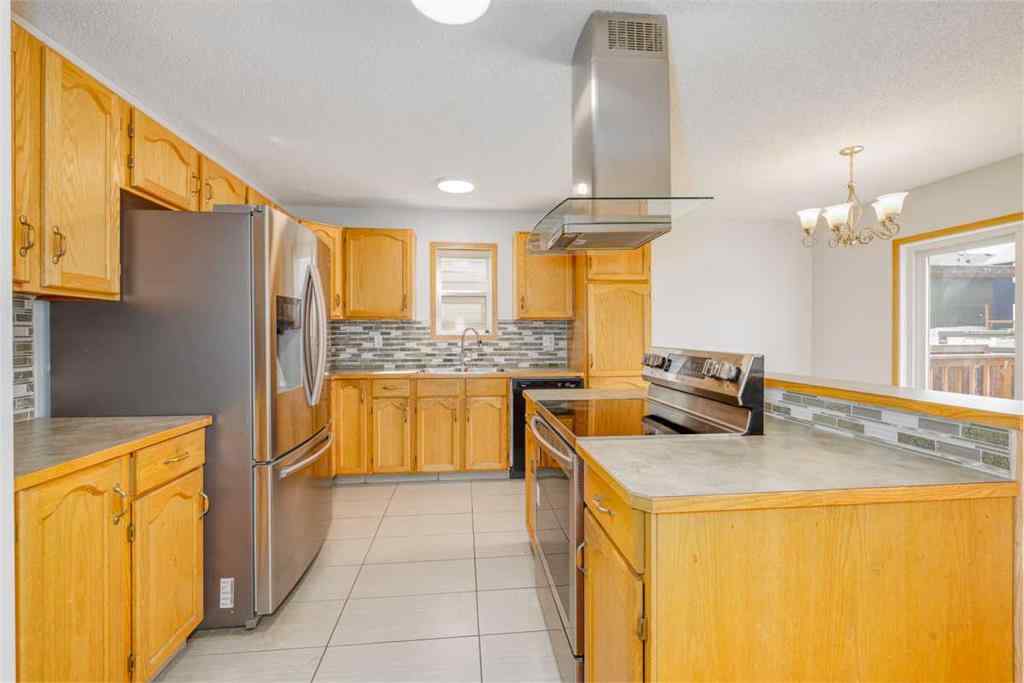 MLS® A2266889 - 6013 Saddlehorn Drive NE in Saddle Ridge Calgary, Residential