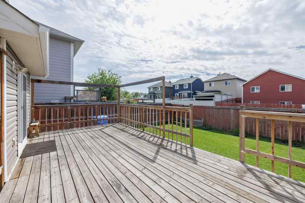 MLS® A2266889 - 6013 Saddlehorn Drive NE in Saddle Ridge Calgary, Residential