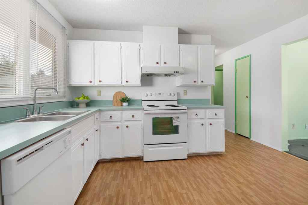 MLS® A2266895 - 228 Queensland Drive SE in Queensland Calgary, Residential